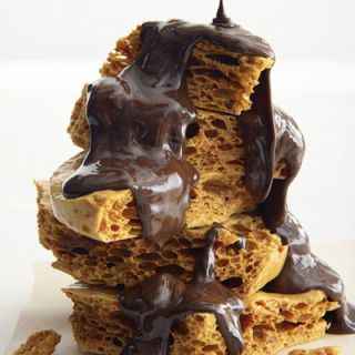 <p>This honeycomb looks like caramel while cooking — then you add baking soda, and the candy bubbles and, just like that, becomes a light and airy concoction.</p>
<p><b>Recipe:</b> <a href="http://www.delish.com/recipefinder/honeycombs-recipe-opr1010" target="_blank"><b>Honeycombs</b></a></p>