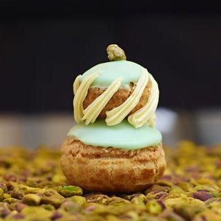 <p><strong>Salted pistachio religieuse, $5</strong><br /><span>Creator of the pastry sensation, the cronut, Dominique Ansel also offers inspired </span><em>religieuses</em><span> at his downtown bakery. The French classic consists of two stacked cream puffs, and his version is filled with both whipped white chocolate–pistachio ganache (on top), and a custardy, salted pistachio mousseline (on the bottom). </span><em><a title="Dominique Ansel Bakery" href="http://www.dominiqueansel.com/" target="_blank">dominiqueansel.com</a></em></p>