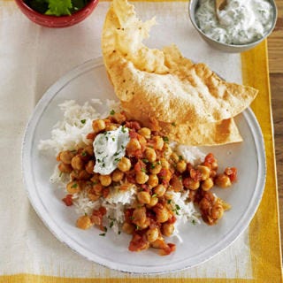 <p>Eaten daily, combined with grains and starches, beans provide high-quality protein along with folate, calcium, iron, and zinc. They also offer benefits like healthy, filling doses of fiber (both soluble and insoluble), phytates, and phyto sterols; studies suggest beans may help manage diabetes, prevent colon cancer, and reduce heart disease risk.</p><br />
<p><b>Recipes: <a href="/recipefinder/gingery-chickpea-tomato-stew-recipe" target="_blank">Gingery Chickpea and Tomato Stew</a></b> (pictured)<br />

<a href="/recipefinder/tomato-coconut-soup-chickpeas-recipe" target="_blank"><b>Tomato-Coconut Soup with Spiced Chickpeas</b></a></p>
