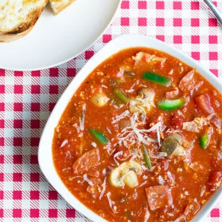 <p> </p> <p><strong>Get the recipe from <a href="http://www.cookthestory.com/2014/11/13/pizza-soup/" target="_blank">Cook the Story</a>.</strong></p>