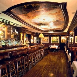 Old Ebbitt Grill <p><b>Date Opened:</b> 1856</p>
<p><b>Location:</b> Washington, D.C.</p>
<p>The Ebbitt was first a boardinghouse hosting famous military heroes and statesmen, where presidents like Ulysses S. Grant, Andrew Johnson, and Theodore Roosevelt wet their whistles at the stand-around bar. In the 1920s, the Ebbitt moved to a converted men's clothing factory replete with Beaux Arts facade and a marble bar set in brass and beveled glass. A copy of that opulent bar and antique chandeliers and fixtures adorn the current location, which boasts Grant's Bar (pictured) with its vast ceiling mural.</p>