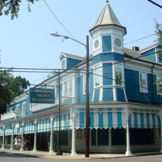 Commander's Palace <p><b>Date Opened:</b> 1880</p>
<p><b>Location:</b> New Orleans, LA</p>
<p>The year James Garfield won the presidency and George Eastman patented the first box camera, Commander's Palace began its tradition of fine <a href="/search/fast_search_recipes?search_term=creole" target="_blank">Creole</a> dining. Though it began as a meeting place for distinguished families, the restaurant became a rendezvous spot for riverboat captains and their lady friends in the 1920s. The 1940s brought new ownership and an expanded food focus. Famous menu items include turtle soup, Champagne-poached <a href="/search/fast_search_recipes?search_term=crabmeat" target="_blank">crabmeat</a>, and <a href="/recipefinder/bread-pudding-souffle-whiskey-sauce-recipe" target="_blank">bread pudding soufflé</a>.</p>