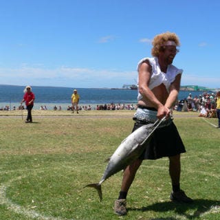 Going on its 50th year, the main attraction at the Tunarama, held the weekend nearest to Australia Day (January 26) in Port Lincoln, Australia, is the World Champion Tuna Toss Competition, where participants hurl a roughly 20-pound tuna. The record — approximately 40 yards — was set in 1998 by a pro: former Olympic hammer thrower Sean Carlin.<br /><br />If eating tuna is more your thing, try one of these <a href="/recipes/cooking-recipes/ideas-canned-tuna-recipes-video-122908" target="_blank">canned tuna recipes</a>.