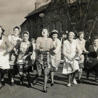 What began more than 500 years ago with one woman's attempt to finish making pancakes has turned into a 415-yard dash in Olney, UK, every year on the Tuesday before Lent, with contestants in aprons carrying skillets. In 1950, the townsfolk of Liberal, Kansas, started their own pancake-day race.<br /><br />Celebrate this international holiday at home by making your own <a href="/recipes/recipe-videos/how-to-make-buttermilk-pancakes" target="_blank">buttermilk pancakes</a>.