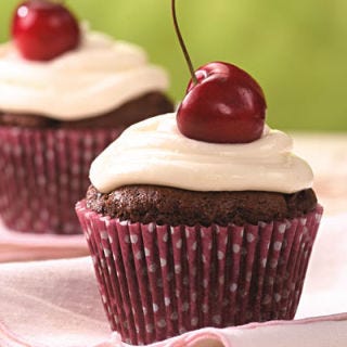 <p>The chopped cherries blend into the ultra-rich chocolate cake, giving these cupcakes a slight cherry flavor while keeping it super-moist with little added oil. The combination of reduced-fat cream cheese and sour cream gives the frosting cheesecake-like flavor with about 40 calories and 3 grams saturated fat less than a traditional cream cheese frosting. </p><br /><p><b>Recipe:</b> <a href="/recipefinder/chocolate-cherry-cupcakes-recipe-ew0610"><b>Chocolate-Cherry Cupcakes</b></a></p>