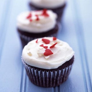 <p>Heart-shaped candies turn simple, moist chocolate cupcakes into an expression of love. And we always swoon over a luscious cream-cheese frosting.</p><br /><p><b>Recipe: <a href="/recipefinder/frosted-chocolate-buttermilk-cupcakes-recipe">Frosted Chocolate-Buttermilk Cupcakes</a> </b></p>