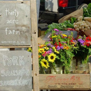 The pride that Maine residents feel for their market probably stems from its deep roots. The government established the official <a href="http://www.portlandmainefarmersmarket.org/" target="_blank"><b>Portland Farmers' Market</b></a> in 1917, and some version market has been serving Portland residents since as far back as 1768. Modern shoppers can pick up fruits — esepcially Maine's famous blueberries — veggies, meat, and eggs from the 40-plus growers and producers selling their goodies on Saturdays from May through November.<br /><br /><b>Recipe:</b> <a href="/recipefinder/yogurt-cake-blueberry-sauce-recipe-tdg0910" target="_blank"><b>Yogurt Cake with Blueberry Sauce</b></a>