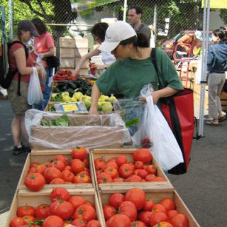 The tourists might go to the famous Pike Place Market, but the locals (and the local farmers and chefs) are at the <a href="http://www.seattlefarmersmarkets.org/markets/u_district" target="_blank"><b>University District Farmers' Market</b></a>. On Saturdays, more than 100 vendors sell delicacies like fiddlehead ferns, raw cow and sheep's milk cheeses, and Mangalitsa pork (a special breed of long-haired pig), as well as market staples like apples (featuring 30 different varieties), mushrooms, peppers, and free-range eggs.<br /><br /><b>Recipe:</b> <a href="/recipefinder/apple-cranberry-crumbler-recipe-tdg0910" target="_blank"><b>Apple Cranberry Crumbler</b></a>