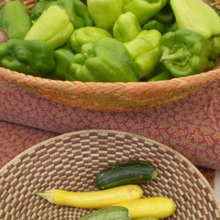 The <a href="http://www.santafefarmersmarket.com/" target="_blank"><b>Santa Fe Farmers' Market</b></a> is ultra-local — farmers must be from one of the 15 counties in northern New Mexico (around Santa Fe), and farmers and producers must sell their produce directly. Additionally, processed foods must contain 80% locally grown ingredients. Two days a week (four in the summer), folks pick up their very local squash, berries, yak meat, heirloom tomatoes, and many varieties of peppers, among other goodies, from more than 100 vendors.<br /><br /><b>Recipe:</b> <a href="/recipefinder/poblanos-stuffed-goat-cheese-shrimp-tdg0910" target="_blank"><b>Poblanos Stuffed with Goat Cheese and Shrimp</b></a>
