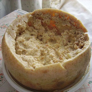 <p><b>Banned:</b> Forbidden in the U.S.</p><br />

<p><b>Reason:</b> Casu marzu, a traditional Sardinian cheese, develops when cheese fly larvae are introduced into Pecorino to promote advanced fermentation. As the larvae hatch and eat through the cheese, it softens. Diners have to dig in before the maggots die. Casu marzu, like many unpasteurized cheeses, is banned in the U.S.</p>