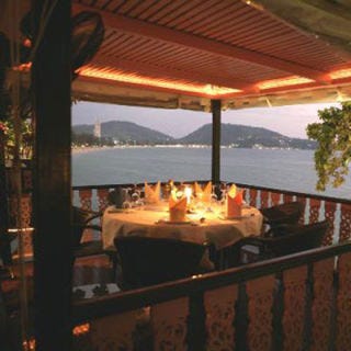 Dine like a king at <a href="http://www.baanrimpa.com/thai-restaurant/" target="_blank">Baan Rim Pa</a> in Phuket, Thailand: literally! The menu is based on "Royal Thai Cuisine" — dishes formerly found only in the kingdom's Grand Palace. Baan Rim Pa is an open air, two-story affair that provides panoramic views of the spectacular beach at Patong and the Bay of Kalim. Savor the sound of the rolling waves along with your coconut sauce.