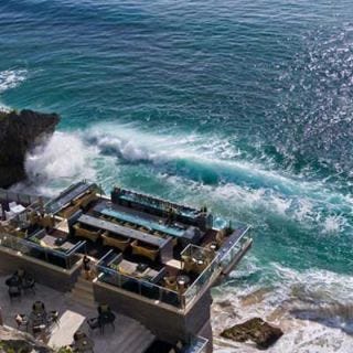 Set on a rock ledge just feet above the waves of the Indian Ocean, the <a href="http://www.ayanaresort.com/rockbarbali/" target="_blank">Rock Bar</a> is the hottest sunset and after-dark spot at Ayana Resort and Spa in beautiful Bali. Toast the open-air sea breezes as you nibble tapas served "on the rocks" — or natural stone plates. The bar's minimalist design puts the emphasis on the spectacular view.