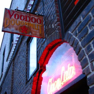 I-5, Oregon <p><b>Pit Stop:</b> <a href="http://www.voodoodoughnut.com/" target="_blank">Voodoo Doughnut</a>, 22 Southwest 3rd Avenue, Portland, OR, (503) 241-4704</p><br /><p>We first grew curious about Voodoo when we learned about <a href="http://gogonow.org/recipes/cooking-recipes/outrageous-burgers%22 target="_blank"><b>"The Original"</b></a>: a burger resting inside a doughnut! If that doesn't have you steering off the highway, then maybe you'll be enticed by their Captain Crunch–topped yeast doughnut or the maple bacon bar? We thought so.</p><p><b>Road Tip:</b> Anytime you're pulling into Portland, Voodoo is open: 24 hours a day, seven days a week.</p>