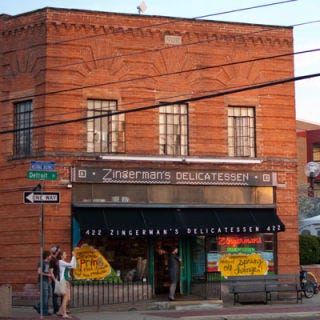 I-94, Michigan <p><b>Pit Stop:</b> <a href="http://www.zingermansdeli.com/" target="_blank">Zingerman's</a>, 422 Detroit Street, Ann Arbor, MI, (734) 663-3354</p><br /><p>Traveling from Detroit to Madison, WI, you'll likely run out of gas. Take a break in Ann Arbor where <a href="http://gogonow.org/food-fun/cool-supermarkets%22 target="_blank"><b>Zingerman's</b></a> rules. Famous for their hot, tender pastrami sandwich, they are also a great pit stop to pick up any other holiday party gourmet treats.</p><p><b>Road Tip:</b> Before skipping town, be sure to head to Zingerman's bakery and coffeehouse for fresh bread and beans.</p>