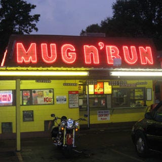 I-65, Indiana <p><b>Pit Stop:</b> <a href="http://www.mug-n-bun.com/" target="_blank">Mug-n-Bun</a>, 5211 W. 10th Street, Indianapolis, IN, (317) 244-5669</p><br /><p>At the Mug-n-Bun in the Hoosier State, the must-eat is the Hoosier tenderloin. What's that, you ask? A juicy fried pork cutlet sandwich. Wash it all down with a frosty mug (or offered by the gallon!) of creamy <a href="http://gogonow.org/recipefinder/root-beer-floats?click=recipe_sr" target="_blank"><b>root beer</b></a>. </p><p><b>Road Tip:</b> If you prefer the carhop service, blink your headlights to get your order in.</p>