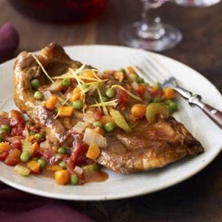 <p><b>Braising Tip:</b> Most recipes call for the meat or poultry to be seared, or browned, in a small amount of oil or butter on the stovetop before being braised in the oven. This method has two main benefits:</p><p>• The sugars on the surface of the meat caramelize and stick to the bottom of the pan, adding rich flavor to the cooking liquid.</p><p>• Natural moisture in the meat gets sealed in, producing a juicier result.</p><br /><p><b>Recipe:</b> <a href="/recipefinder/veal-chops-osso-buco-recipe" target="_blank"><b>Veal Shoulder Chops, Osso Buco Style</b></a></p>