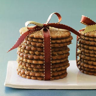 Perfect Pan Preparation <p>Properly choosing and preparing baking pans will ensure your picture-perfect cakes, brownies, and tarts won't stick when they're done baking.</p>
<p><b>Special Tips for ...</b></p>
<p><b>Brownies:</b> Light aluminum or glass pans work best for baking brownies — dark-colored pans can cause brownies to brown excessively. Also, always grease the pan well. If you're worried about the brownies sticking, you can line the pan with aluminum foil before adding the batter.</p>
<p><b>Cakes:</b> When preparing cake pans, first grease with butter, then for vanilla-based cakes, dust with 1/4 cup flour. For chocolate-based cakes, dust with 1/4 cup cocoa powder. Shake the flour or cocoa powder around the pan to evenly cover the bottom and sides, then tap out excess. When using parchment paper, first grease the pan, then smooth a properly cut piece of parchment paper on top of the butter. Next, dust with flour or cocoa powder and tap to remove excess.</p>
<p><b>Cookies: </b>For evenly cooked and shaped cookies, always start with room-temperature baking sheets and grease sparingly, if recipe calls for it.</p>
<p><b>Pictured Recipe:</b> <a href="/recipefinder/ginger-wafer-crisps-recipe-rbk1210" target="_blank"><b>Ginger Wafer Crisps</b></a></p>