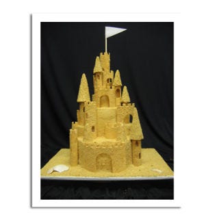 Sand Castle Cake <b>Bakery:</b> <a href="http://www.bing.com/search?q=%2bClassic+Cakes%2c+Carmel&FORM=delish" target="_blank">Classic Cakes</a>, Carmel, IN<br /><b>Cake Challenge:</b> Beach blanket bingo. This castle cake is drenched in buttercream frosting and coated in crushed graham crackers. Sand-tastic! <br /><br /><b>Bing:</b> <a href="http://www.bing.com/images/search?q=sand+castle+cake&qpvt=sand+castle+cake&FORM=delish" target="_blank">See other sand castle cakes</a> <br /><b>Find:</b> <a href="http://www.bing.com/search?q=sand+castle+cake&FORM=delish" target="_blank">Make your own</a>