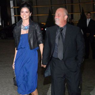 Happy couple Katie Lee and Billy Joel attend the wedding of friends Howard Stern and Beth Ostrosky at Le Cirque in New York City.
