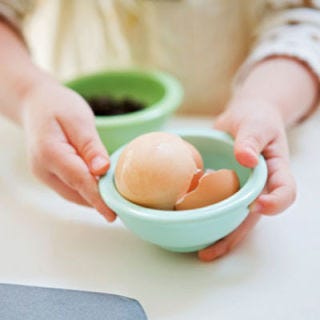 The most dramatic moment of any competition cooking show, especially <i>Iron Chef,</i> is the reveal of the secret ingredient. But how to pick an ingredient that guarantees success? Keep in mind the children's ages and taste preferences. Are you hoping they'll try something new, or do you just want them to have plain old fun? Besides eggs, foods like apples, cheese, and bread make for versatile and kid-friendly selections. You can also choose a theme like Smoothie Showdown or No-Bake Cookie Contest. Check out simple, kid-friendly recipes like <strong><a href="/recipefinder/quick-applesauce-recipe-5446" target="_blank">Quick Applesauce</a></strong>, <strong><a href="/recipefinder/grilled-three-cheese-sandwiches-ghk" target="_blank">Grilled Three-Cheese Sandwiches</a></strong>, and <strong><a href="/recipefinder/no-bake-chocolate-crackles-1966" target="_blank">No-Bake Chocolate Crackles</a></strong> for inspiration.