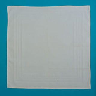 Take a solid-colored square napkin, and starch it for optimal workability. Thinner napkins work better, so choose a linen napkin over a thick cotton one.