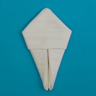 Gently turn your napkin over.