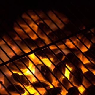 Lay sweet potatoes, onions, and even corn in the husk directly on the embers. Roast, turning with tongs, until the skins are coal black. When you scrape off the burned skin, the vegetable inside will be supernaturally sweet and smoky.