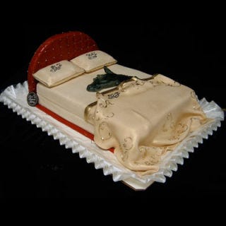 <b>The Bakers:</b> <a href="http://www.freedsbakery.com/" target="_blank">Freed's Bakery of Las Vegas</a>, Las Vegas, NV<br />
<b>The Challenge:</b> Re-create a scene from <i>The Godfather</i> for a groom known as "The Godfather."<br />
<b>Fantastic Flavor:</b> Rich chocolate cake with Bavarian cream layered with raspberry<br />