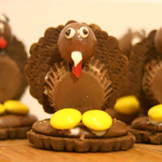 <b>Vital Components:</b> Yellow M&M's for feet, Reese's Peanut Butter Cup body, and Twizzlers for the beak.