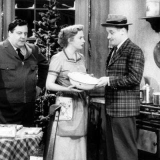 <p>Ralph and Alice Cramden spent every episode arguing in their sparse, tiny 1950s Brooklyn kitchen. <a href="http://www.bing.com/celebrities/overview/search?q=Audrey+Meadows&id=c6573932-f9cf-1dd3-5ede-08dfbf54ae1e&FORM=delish" target="_blank">Alice</a> was constantly plagued by <a href="http://www.bing.com/celebrities/overview/search?q=jackie+gleason&qs=n&sk=&sc=8-14&form=delish" target="_blank">Ralph's</a> complaints about every meal she prepared, and, of course, he often threatened to send her "to the moon!" Though pretty dingy, their kitchen had some cheerful aspects, like their checkered tablecloth and the (now antique) basin sink with dual faucets for hot and cold.</p><br /><p><a href="http://www.bing.com/videos/search?q=honeymooners+theme&view=detail&mid=0910AEAB500BA2A0D43A0910AEAB500BA2A0D43A&first=0&FORM=delish" target="_blank">Watch the opening theme</a></p><br /><p><a href="http://www.bing.com/videos/search?q=honeymooners+filterui%3aduration-short&view=detail&mid=F72BE3B355B1F2E256BBF72BE3B355B1F2E256BB&first=0&FORM=delish" target="_blank">Watch Ralph and Norton in the kitchen</a></p><br /><p><a href="http://www.bing.com/videos/search?q=jackie+gleason+to+the+moon+alice&view=detail&mid=5FDC6CBC4828388D3FBD5FDC6CBC4828388D3FBD&first=0&FORM=delish" target="_blank">Watch clips of the scrappy couple</a></p><br /><p><a href="http://www.bing.com/videos/search?q=jacky+gleason&view=detail&mid=B667EB5506162C297BB8B667EB5506162C297BB8&first=0&FORM=delish" target="_blank">Watch Dan Rather with Gleason's obituary </a></p><br /><p><a href="http://www.bing.com/images/search?q=50s+kitchen&go=&qs=n&sk=&sc=8-11&form=delish" target="_blank">Photos of '50s kitchens</a></p>