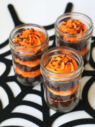 <div class="imageContent">
<p>The only thing we love more than this idea for orange-and-black cupcakes is the spider web trivet they're sitting on. </p>
<p><strong>Get the recipe at <a href="http://www.glorioustreats.com/2011/10/halloween-cupcakes-in-a-jar.html" target="_blank">Glorious Treats</a>.</strong></p>
<p><strong>RELATED:</strong> <a href="http://www.countryliving.com/crafts/projects/mason-jars" target="_blank">50 Best Ways to Use Mason Jars</a></p>
</div>