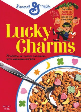 <p>The original box contained toasted oat cereal puffs with marshmallows in the shape of green clovers, yellow moons, yellow and orange stars, and pink hearts. The cereal is in the shape of bells, fish, crosses, three-leaf clovers, and trees. Some theorize these are early Christian symbols, while others claim they are talisman symbols, carried for good luck during medieval times. </p>