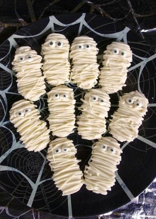 <p>That isn't plain old white chocolate on these adorable mummies, it's melted down vanilla almond bark. Sold yet?</p>
<p><strong>Get the recipe from <a href="http://www.plainchicken.com/2013/10/nutter-mummies.html" target="_blank">Plain Chicken</a>.</strong></p>