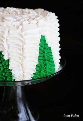Dessert, Kitchen utensil, Cake, Cake decorating, Icing, Dairy, Cream, Baked goods, Still life photography, Sugar cake, 
