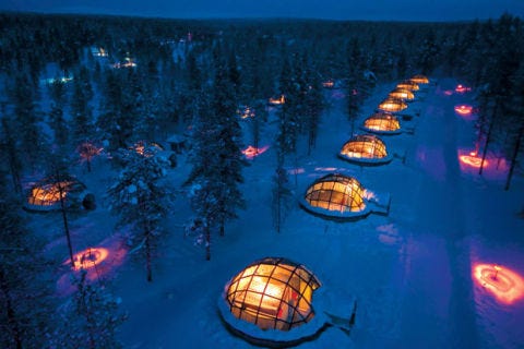 Opening in December or January and running through April each year, <a href="http://www.kakslauttanen.fi/en/" target="_blank">Hotel Kakslauttanen’s Igloo Village</a> offers guest the opportunity to sleep in the comfortable silence of a snow igloo (20 glass igloos and one special glass kota [similar to a teepee] are also available). If you’re equipped with wool socks and a hood, along with a super-warm sleeping bag that can withstand temperatures up to -32 degrees Celsius (all of which are provided), the hotel promises you’ll never feel cold. The on-premises Ice Gallery is a must-see, with ice and snow sculptures from international artists (and you can even take a lesson to test your sculpting skills).