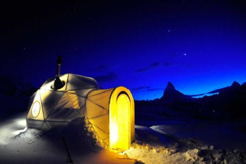 Last year, Iglu-Dorf operated six igloo villages across three countries, and they'll be at in again this season (starting around Christmas and running through mid-April). Standard igloos come with six beds, while romantic igloos offer a more intimate experience. Mulled wine and cheese fondue are included, and public whirlpool and sauna (the latter at Davos and Gstaad locations only) add to the amenities. Perhaps most unbelievable, Iglu-Dorf now has a <a href="http://www.iglu-dorf.com/en/uebernachtung/zimmer/hot-iglu.htm" target="_blank">heated igloo</a> that comes with a wood stove and is decorated with sheepskins.