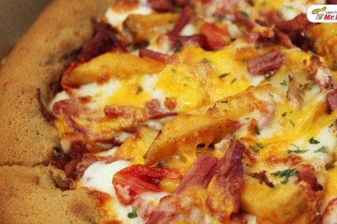<p>The Grand Prix Cookie Crust Pizza comes topped with shrimp and potato and is served by Mr. Pizza in South Korea. The crust is actually made of cookie and the shrimp and potato topping is sprinkled with pumpkin seeds and raisins.
</p>