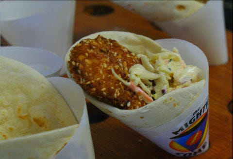 <p>This Hot & Crunch Chicken Cone from <a href="http://www.mightycone.com/" target="_blank">Mighty Cone</a> is better than your basic fried chicken — that irresistible coating is made with sesame seeds, almonds, chili flakes, and corn flakes for a bit of a bite with big time crunch. Mighty Cone's menu proves why transforming fried chicken into a handy cone is only natural; you can upgrade your chicken with a healthy helping of avocado. We've never had fried chicken with avocado before, but we're betting on it being delicious.</p>