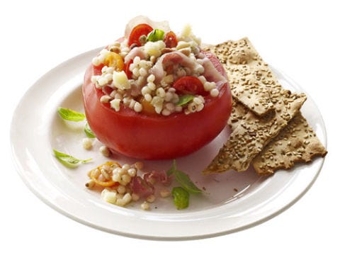<p>Unrefined grains (pasta, bread, barley, couscous) are the base of most Mediterranean diets. Leaving the grains whole lowers their glycemic index, so they are digested more slowly and produce gentler rises in glucose and insulin than refined versions; they also retain all their fiber, magnesium, vitamin E, and other antioxidants. Diets rich in whole grains may protect against heart disease, diabetes, and other chronic diseases.</p><br />
<p><b>Recipes: <a href="http://gogonow.org/recipefinder/couscous-stuffed-tomatoes-recipe-rbk0811%22 target="_blank">Couscous-Stuffed Tomatoes</a></b> (pictured)<br />
<a href="/recipefinder/couscous-crusted-salmon-recipe-ghk0213" target="_blank"><b>Couscous-Crusted Salmon</b></a></p>

