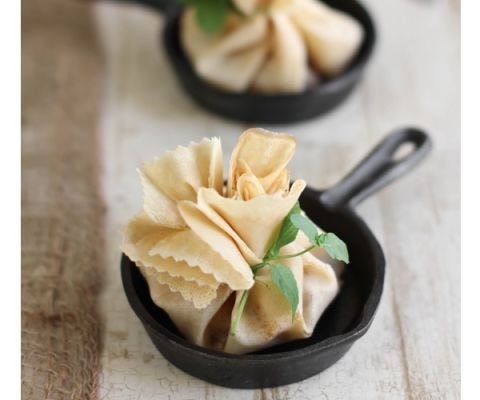 <p>Pumpkin and chocolate cupcakes combine the classic colors and flavors of Halloween.</p> <p><strong>Get the recipe from <a href="http://www.sprinklebakes.com/2012/11/caramel-apple-brie-crepe-parcels.html" target="_blank">SprinkleBakes</a>.</strong></p>