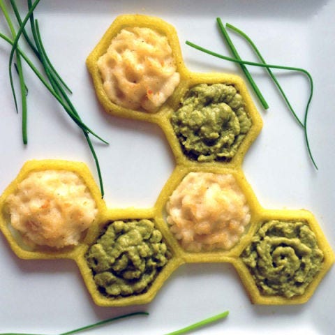 This may look nothing like the classic and beloved British dish, but though it comes in a different form, all of the same comforting flavors are still here — the green hexagons even hold the most traditional of British sides, mushy peas!
