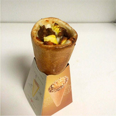 <p>We'd all love to leisurely sit down to a plate of hot eggs and sausage each morning, but few of us realize this dream. <a href="http://www.konopizza.ca/" target="_blank">Kono Pizza</a> makes your hectic schedule work with your hot breakfast cravings by transforming the diner staple into a grab-and-go option. Though their Salsiccia Prima is a best-seller (three cheeses, eggs, and sausage), they also offer vegetarian and bacon-studded varieties.</p>