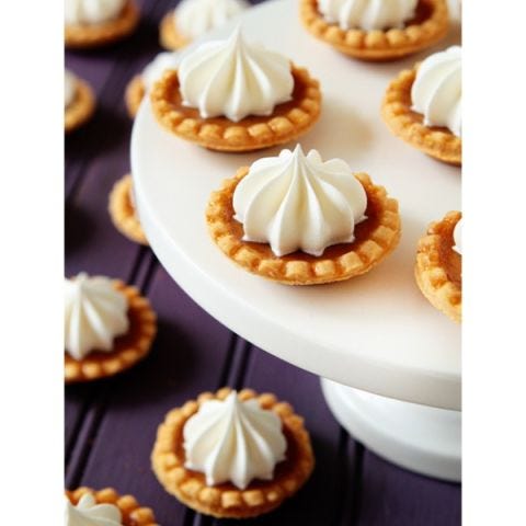 <p>Pumpkin and chocolate cupcakes combine the classic colors and flavors of Halloween.</p> <p><strong>Get the recipe from <a href="http://www.mybakingaddiction.com/mini-pumpkin-pies/" target="_blank">My Baking Addiction</a>.</strong></p>