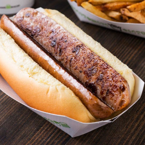 <p><b>Stadium:</b> <a href="http://newyork.mets.mlb.com/nym/ballpark/index.jsp"target="_blank">Citi Field</a></p>
<p><b>Why It's a Hit:</b> Shake Shack. Though Mets fans lost their beloved Shea Stadium in 2008, the new Citi Field has a culinary bonus: an outpost of chef Danny Meyer's <a href="http://shakeshack.com/"target="_blank">Shake Shack</a>. Shake Shack started in 2004 as a Manhattan take-out stand where sophisticated New Yorkers queued up for sliders and franks. Its Citi Field branch showcases flat-top dogs: a Vienna all-beef or chicken, apple, and sage sausage dog that's split and griddled until crispy on the outside.</p>