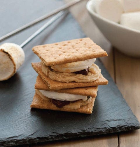 "I'm not an outdoors kind of person. I'm more of a stay-where-I-can-shower-on-a-daily-basis kind of person. However, even I would brave the wild frontier for some of the roasty-toasty melted goodness of campfire s'mores. This indulgent twist on a classic summertime treat is easy to create in your own home — it's a homebody's dream come true." — Lindsay Landis
 Recipe: Cookie Dough S'mores