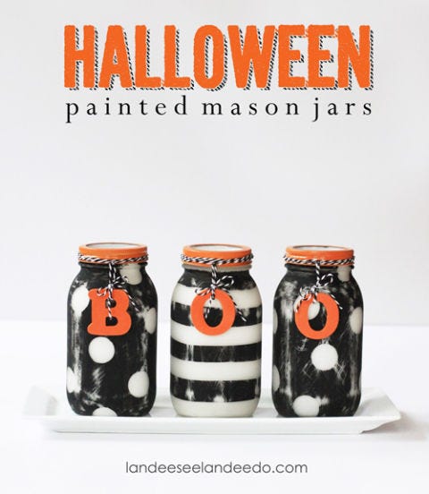 <div class="imageContent">
<p>Add these <em>boo</em>-tiful jars to a kitchen table, a mantel, or a staircase. </p>
<p><strong>Get the tutorial at <a href="http://www.landeeseelandeedo.com/2013/09/halloween-painted-mason-jars-2.html" target="_blank">Landee See, LandeeDo</a>.</strong></p>
<p><strong>RELATED:</strong> <a href="http://www.countryliving.com/crafts/projects/best-halloween-crafts-ever#slide-1" target="_blank">43 Spooky and Creative Halloween Craft Projects</a></p>
</div>