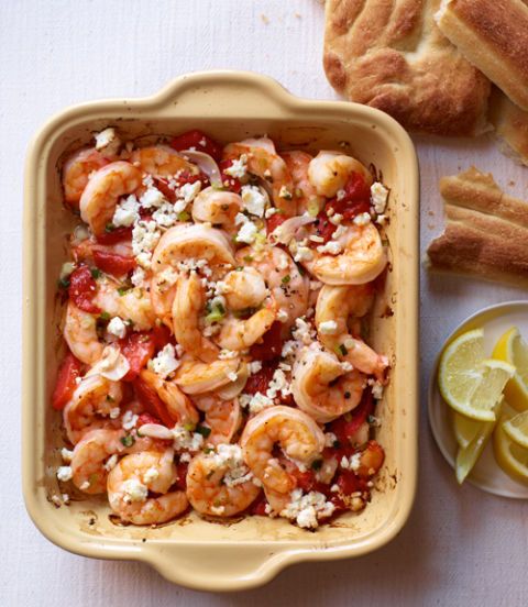 <p>The five minutes of prep for this dish is no joke: with a quick toss it all comes together shockingly fast — and flavorfully, with the bright acidity of lemon and white wine playing off salty feta and roasted red peppers.</p>  <p><strong>Recipe:</strong> <a href="http://www.delish.com/recipefinder/garlicky-roasted-shrimp-red-peppers-feta-recipe-124665" target="_blank"><strong>Garlicky Roasted Shrimp, Red Peppers, and Feta</strong></a></p>  