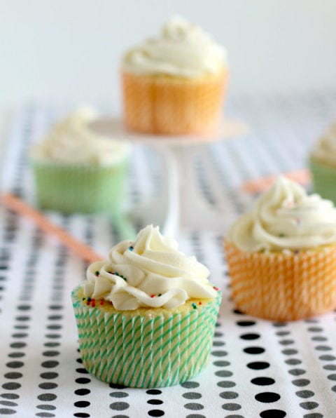 <p>This seemingly ordinary cupcake holds a delicious secret. No worries; it only takes one bite to get this cupcake to spill its sweet secrets.</p>
<p><strong>Recipe:</strong> <a href="http://iambaker.net/vanilla-cupcake-surprise-inside/"><strong>Vanilla Cupcake with a Surprise Inside</strong></a></p>