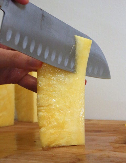 <p>For each piece, slice off the tough core, which is found in the center of the fruit. Some people actually like the fibrous core and leave it in, although it should be noted that it can irritate your mouth.</p>