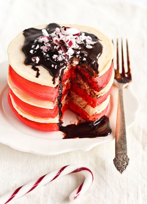 <p>A little food coloring and candy canes makes this decadent and festive breakfast.</p> <p><strong>Get the recipe from <a href="http://www.raspberricupcakes.com/2011/12/christmas-pancakes-with-candy-cane.html" target="_blank">Raspberri Cupcakes</a>.</strong></p>